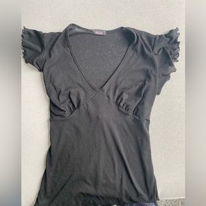Verite Black top with its own flare. fits S-M